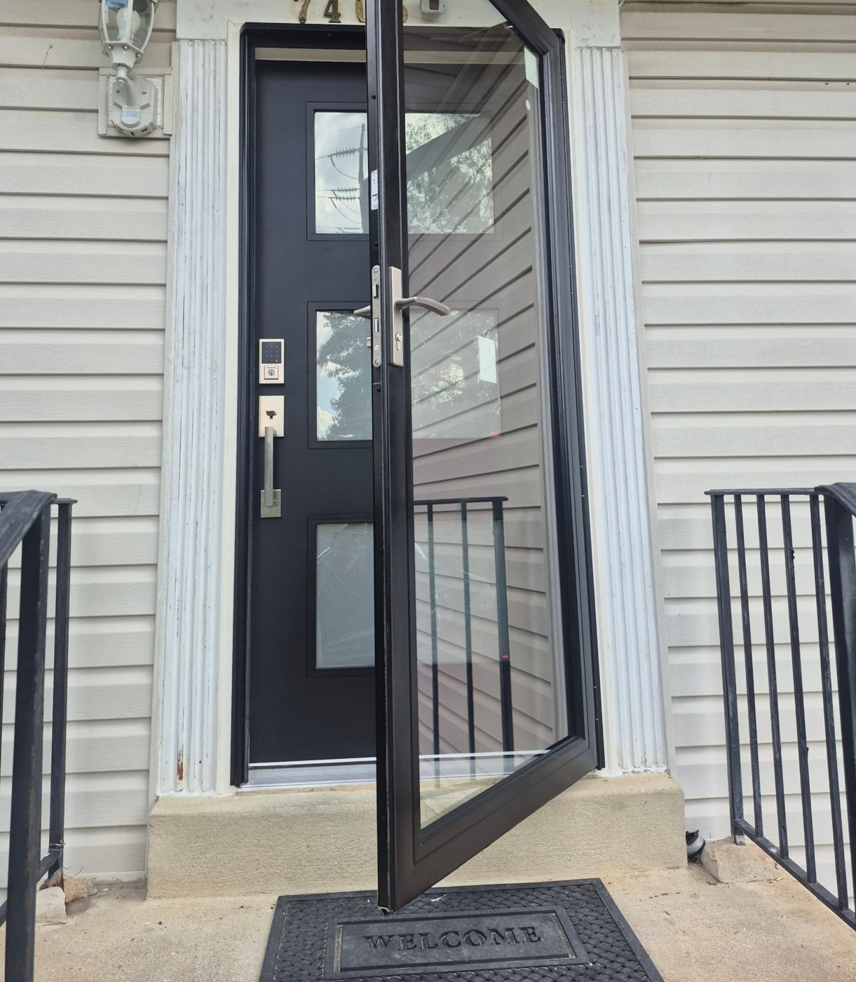 New entry door, smart lock and storm door