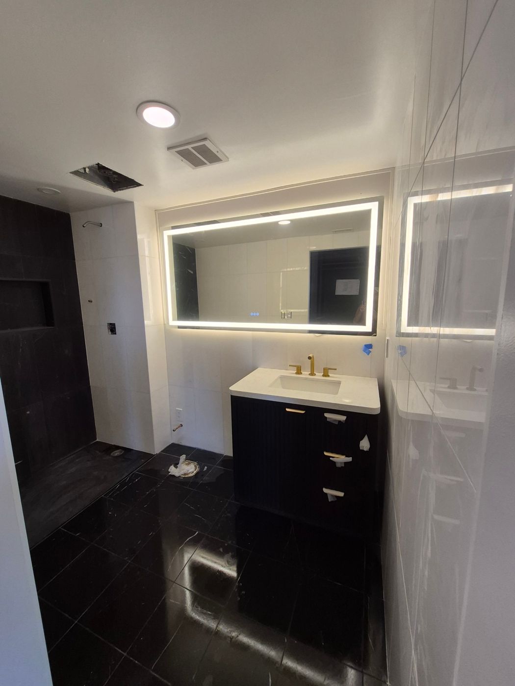 Modern bath with LED mirror (finishing stage)